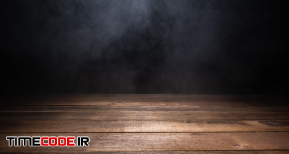 Empty Wooden Table With Smoke Floating Up On Dark Background 