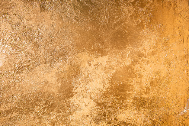 Abstract Gold Texture. Wall Colored With Golden Plaster. 