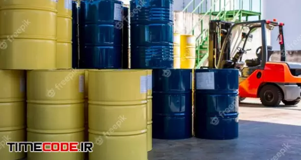 Oil Barrels Blue Or Chemical Drums Vertical Stacked Up Industry Forklift Truck Move For On The Transportation 