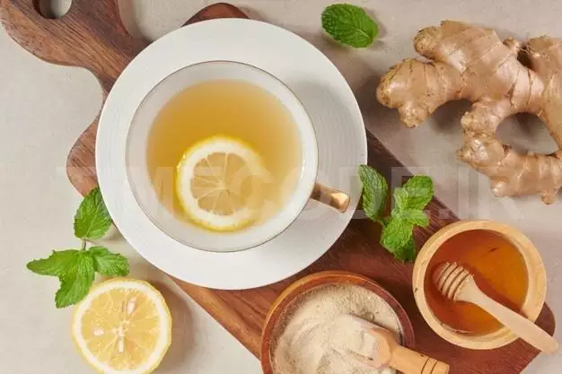 Ginger Tea Ingredients, Healthy Comforting And Heating Tea Under Simple Recipe. Ginger Tea And Ingredients - Lemon, Honey.top View. Flat Lay. Freshly From Home Growth Organic Garden. Food Concept. Free Photo