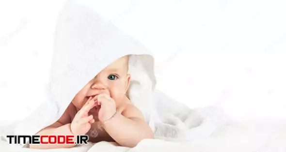 Close-up Child In White Towel Isolated On White. Bathing Babies And Restful Sleep. Funny Toddler. 