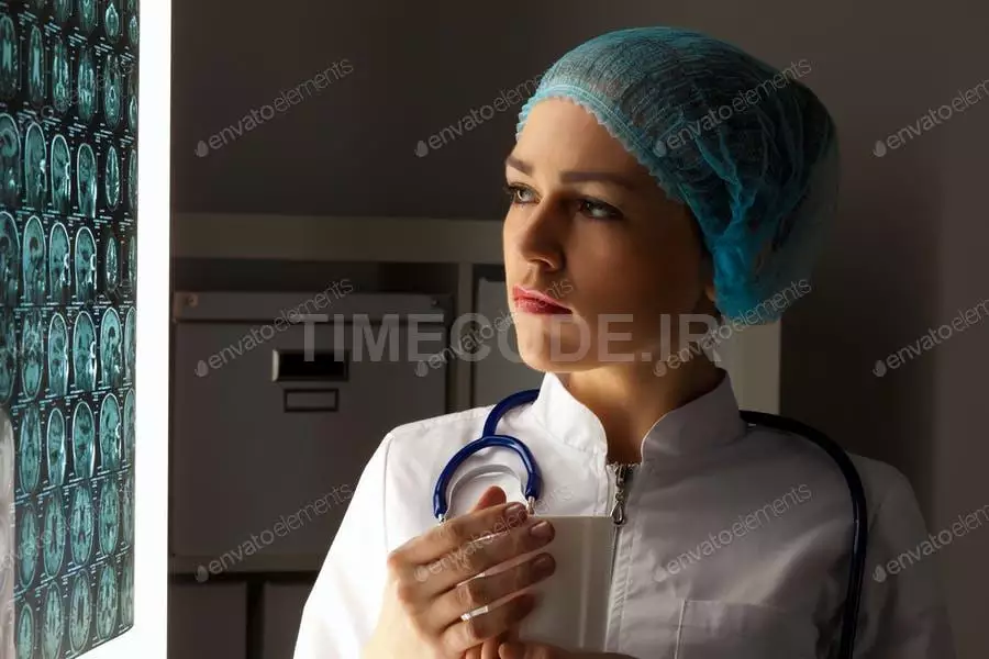 Woman Doctor Examining X-ray