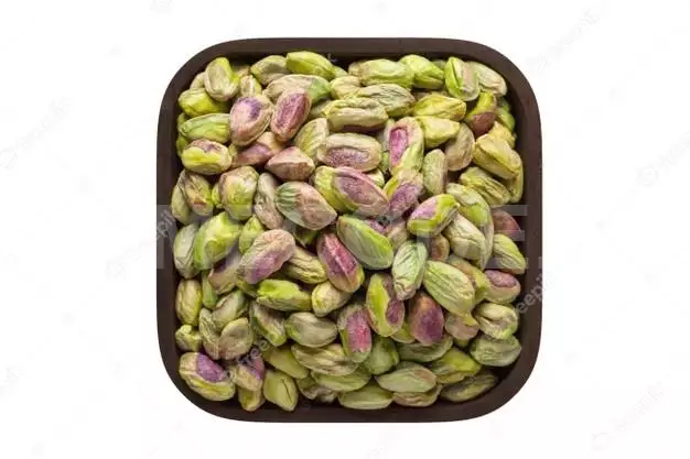 Pistachios Nuts Peeled In Square Bowl Isolated On White Background. Organic Food, Top View. 