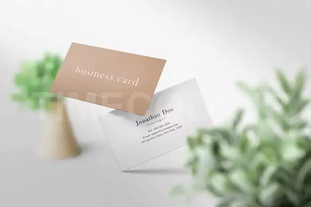 Clean Minimal Business Card Mockup Floating On The Floor With Green Leaves Free Psd