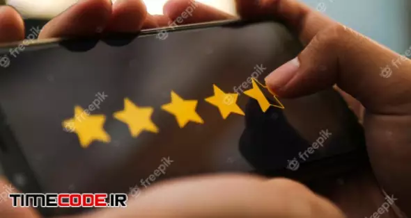 Attractive Hands Giving Four Point Five Star Rating On A Smart Phone 
