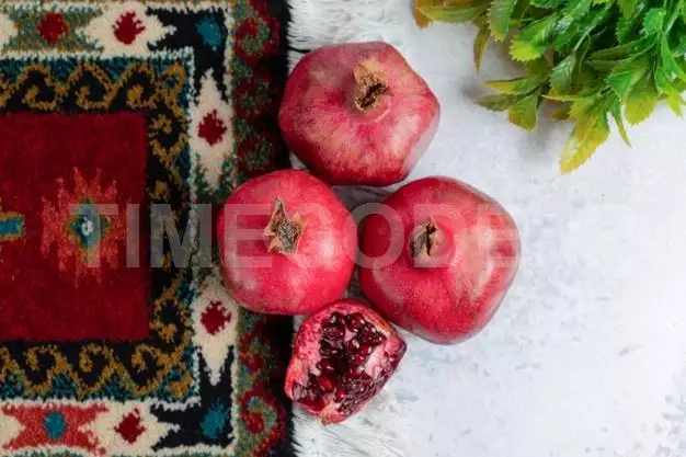 Top View Of Photo Of Fresh Sliced And Whole Pomegranate . Free Photo