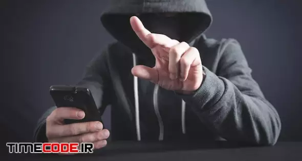 Hacker Using Smartphone And Touching In Empty Screen. Cyber Crime 