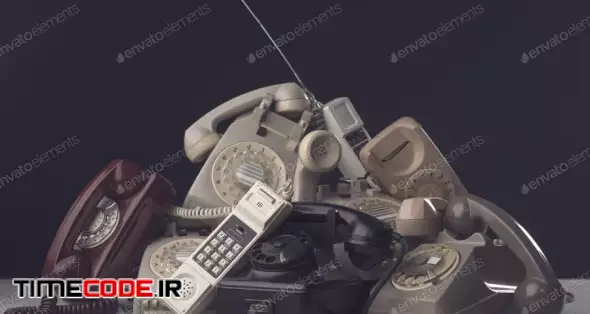 Heap Of Vintage Telephones And Receivers