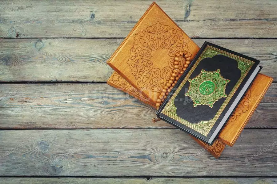 Three Months. Islamic Holy Book Quran With Rosary Beads. Ramadan Concept