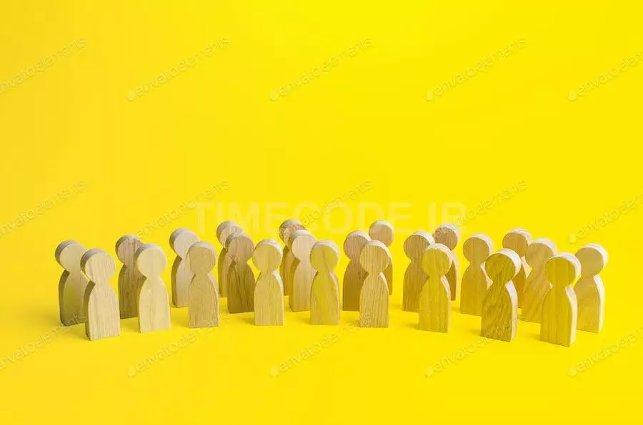 A Large Group Of Figurines Of People On A Yellow Background.