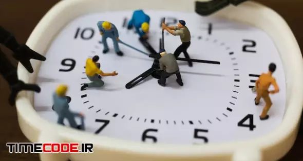 Miniature People : The Team Is Working On An Alarm Clocks