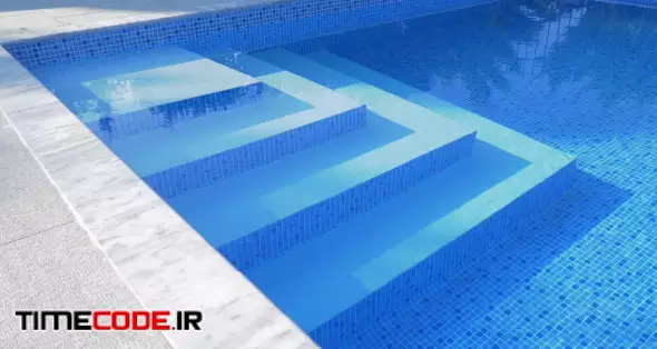 Underwater stairs in outdoor blue tiled swimming pool with clear water. Spa and resort 00:20