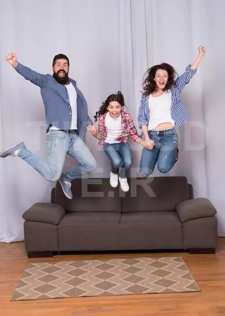 Full Of Energy Childhood Happiness Happy Family Day Spending Time Together Happy People Jump From Feeling Of Freedom Mother Father And Daughter Having Fun At Home Move In New House