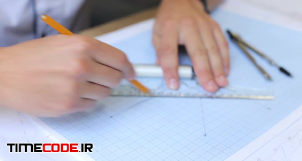 Engineer Drawing On Graph Paper
