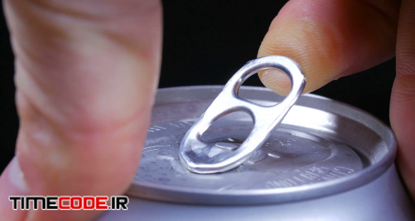 Macro Close Up Of Lid As Hand Opens A Canned Drink