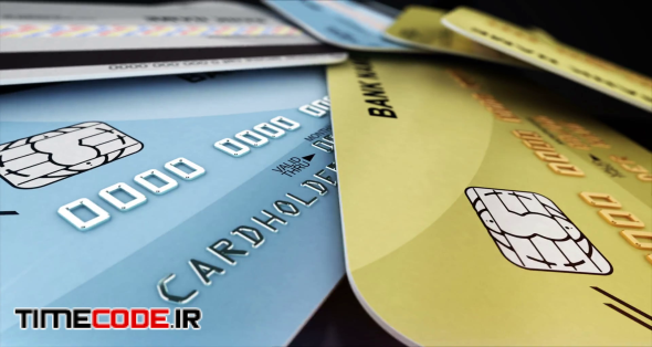 A few color credit cards rotate on a glossy black background. Closeup shot with depth of fields. Shopping concept. Seamless loop.