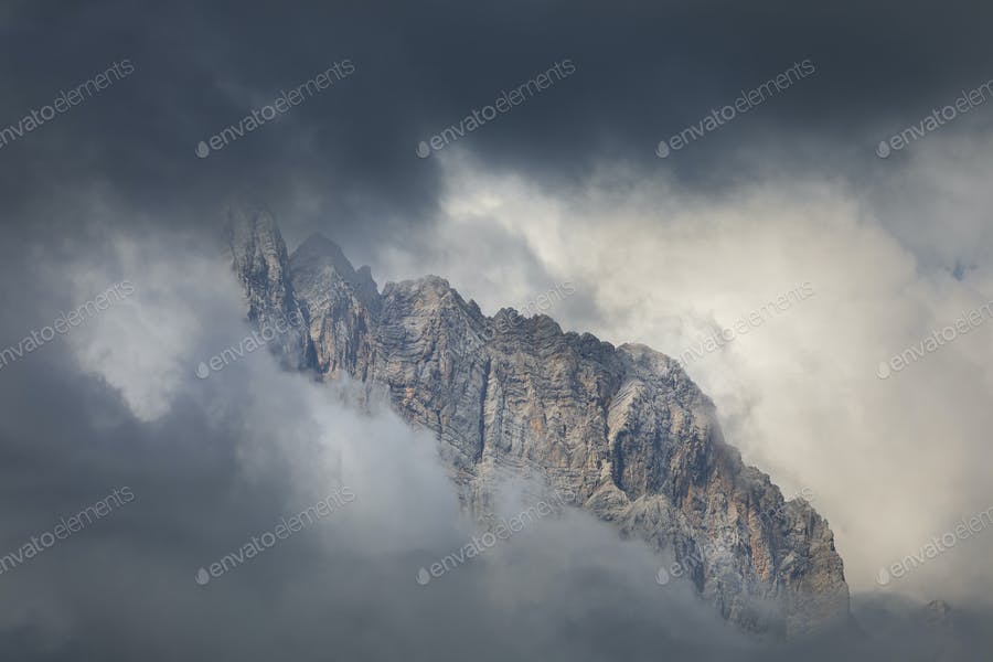 Mountain Peaks In Clouds
