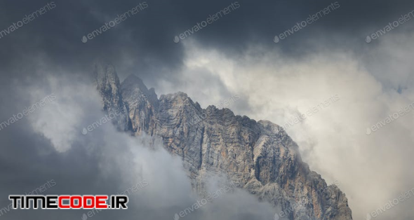 Mountain Peaks In Clouds