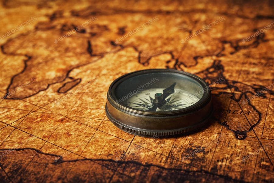 Old Vintage Compass On Ancient Map