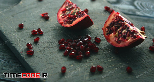 Halves Of Pomegranate With Seeds