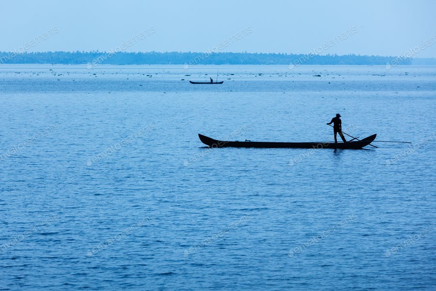 Man On Boat. Kerala, India