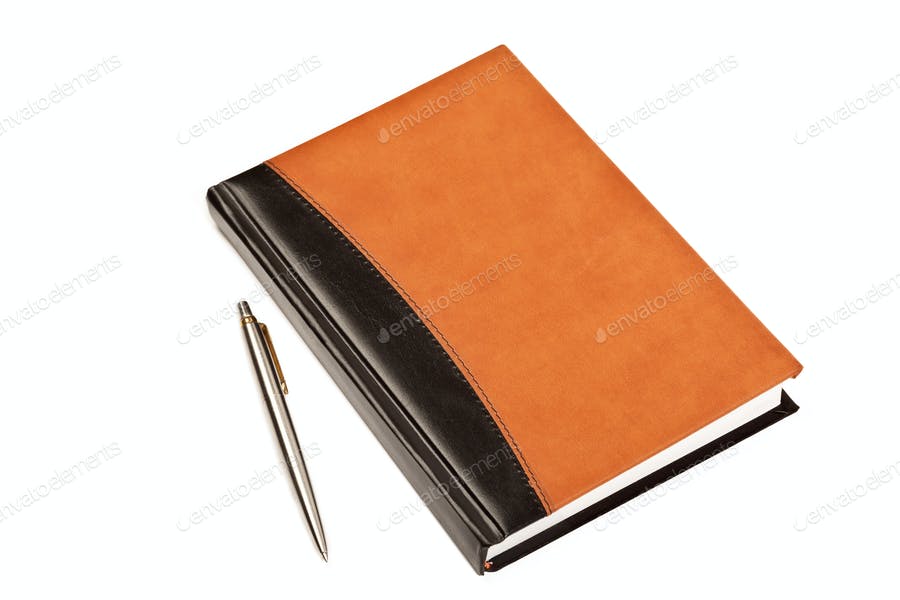 Diary And Pen On Table Isolated