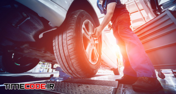 Automotive Suspension Test And Brake Test Rolls In A Auto Repair Service. 